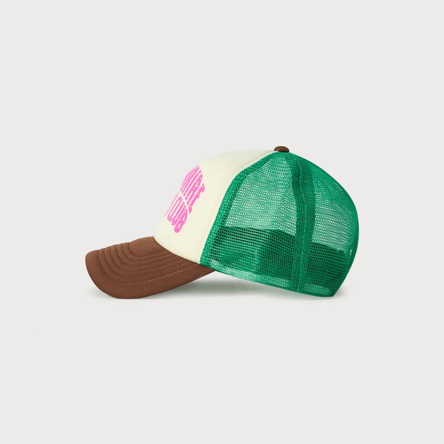 Trucker hat with green mesh back, brown bill, and pink logo on a light gray background
