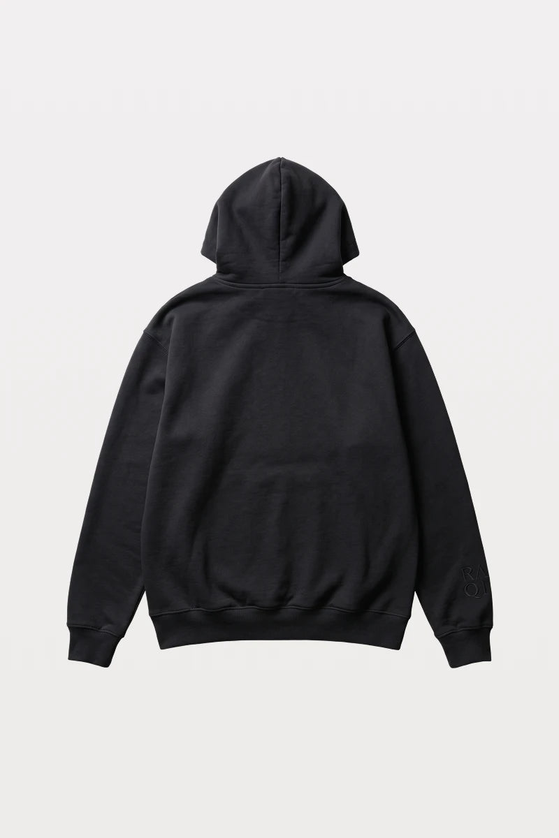 RAQI black pullover hoodie with a relaxed fit, spacious hood, and subtle tonal branding on the sleeve.